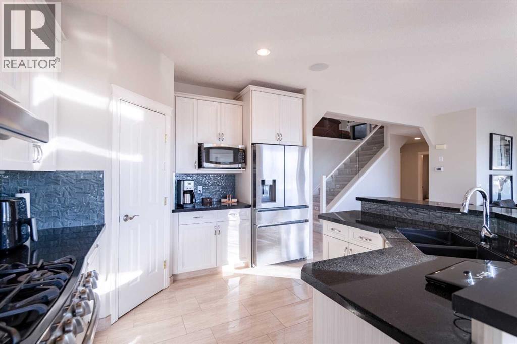 109 Simcrest Heights Sw, Calgary, Alberta  T3H 4K1 - Photo 23 - A2278428