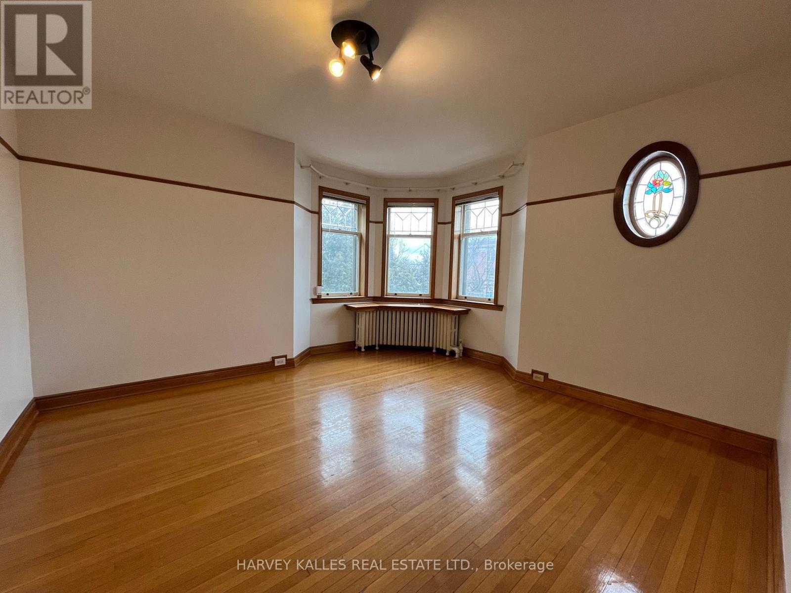 -Apt B - 3 Northcliffe Boulevard, Toronto, Ontario  M6H 3G9 - Photo 4 - W12681490