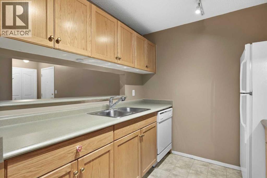 2113, 2113 Tuscarora Manor Nw, Calgary, Alberta  T3L 2J9 - Photo 12 - A2268699