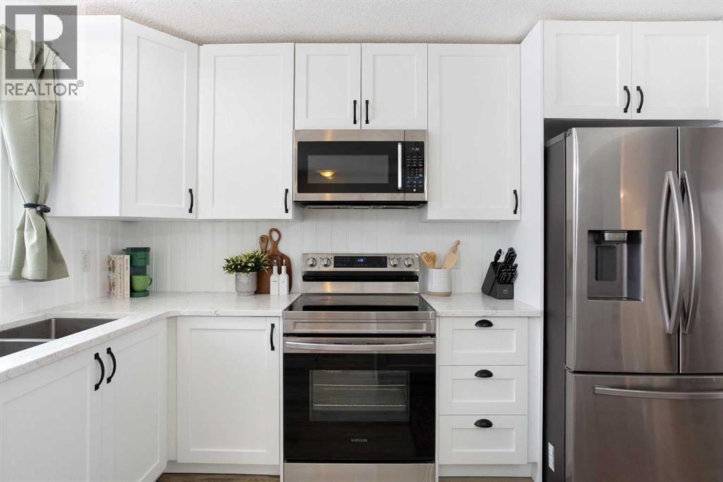 2348 Reunion Rise Nw, Airdrie, Alberta  T4B 0M5 - Photo 4 - A2276400