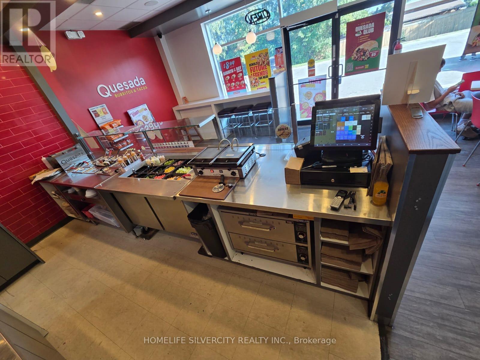 101 - 358 Speers Road, Oakville, Ontario  L6K 3R9 - Photo 2 - W12678084