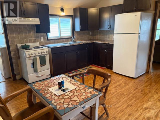 15588 Highway 35, Algonquin Highlands, Ontario  K0M 2K0 - Photo 10 - X12460877