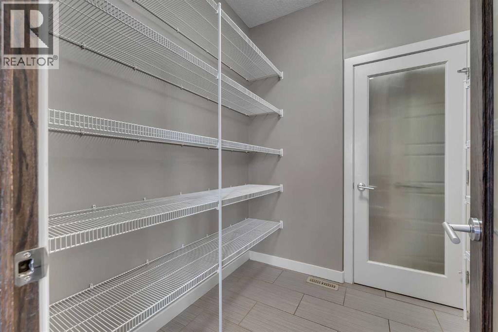 204 Sunset View, Cochrane, Alberta  T4C 0E9 - Photo 21 - A2268934