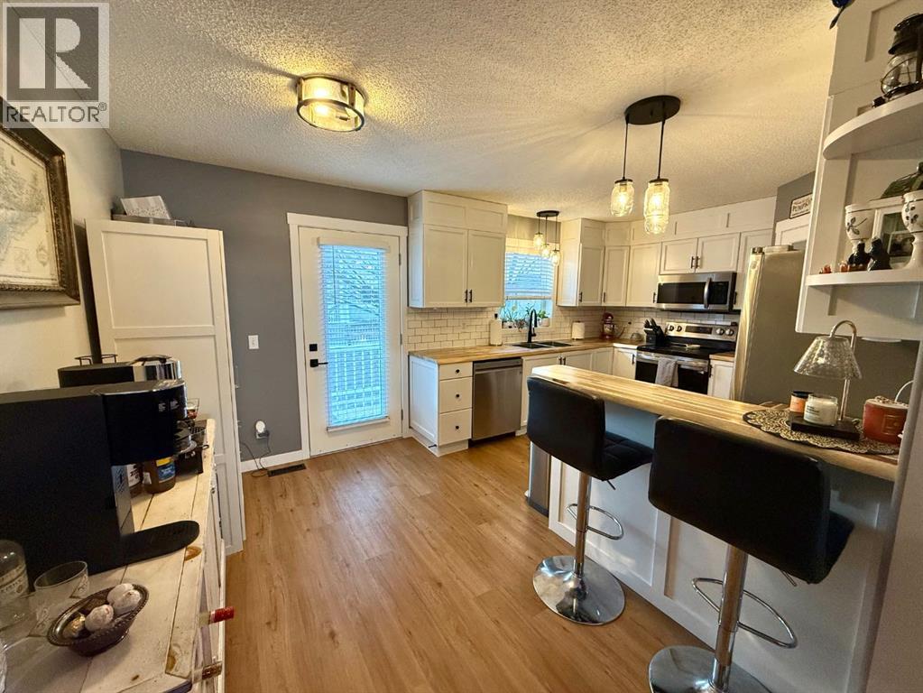 606 Prairie Sound Circle Nw, High River, Alberta  T1V 2A5 - Photo 6 - A2278337