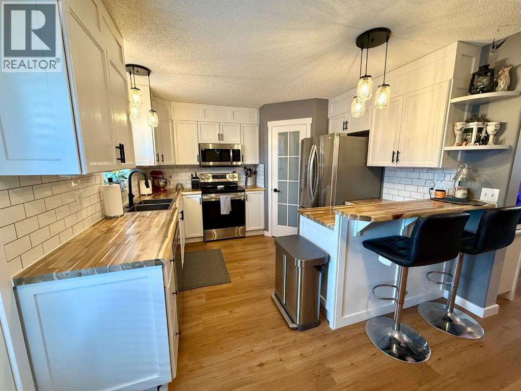 606 Prairie Sound Circle Nw, High River, Alberta  T1V 2A5 - Photo 8 - A2278337