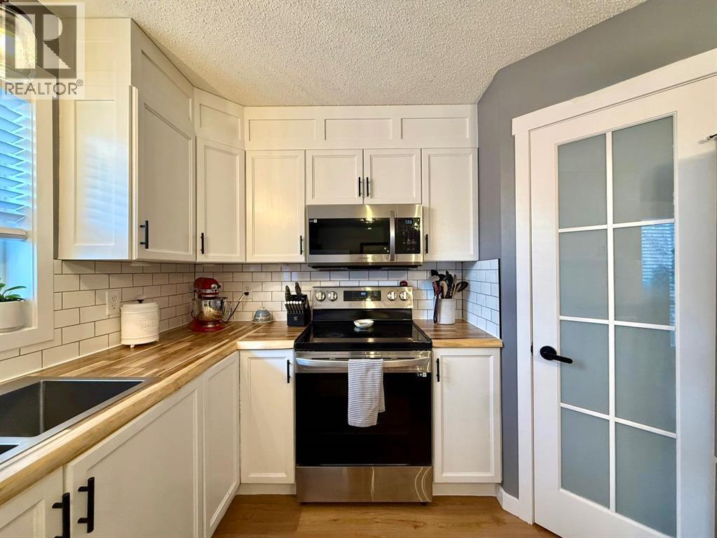 606 Prairie Sound Circle Nw, High River, Alberta  T1V 2A5 - Photo 10 - A2278337