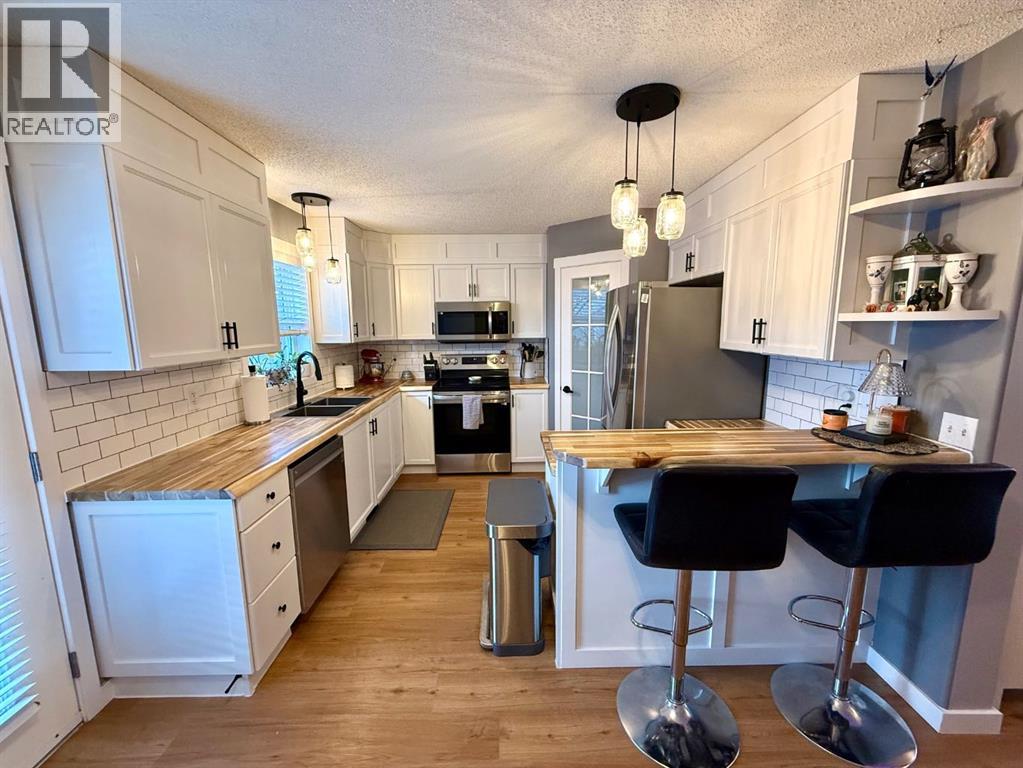 606 Prairie Sound Circle Nw, High River, Alberta  T1V 2A5 - Photo 7 - A2278337