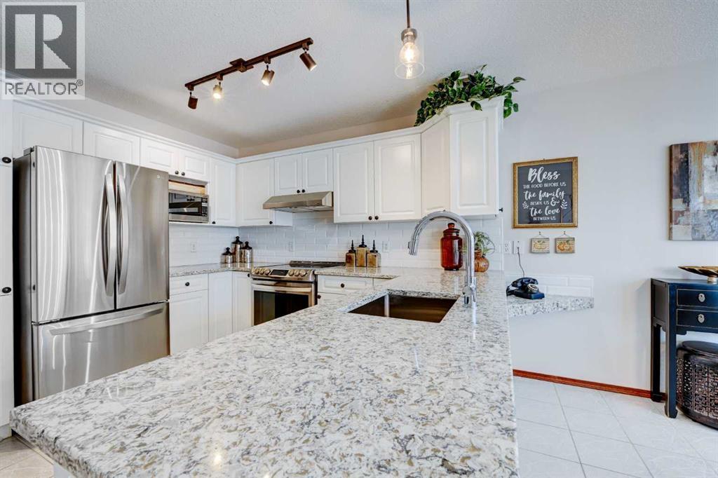 6558 Sierra Morena Boulevard Sw, Calgary, Alberta  T3H 3R3 - Photo 12 - A2278161