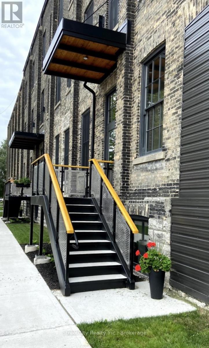 104 - 245 Downie Street, Stratford, Ontario N5A 1X5 - Photo 1 - X12394270