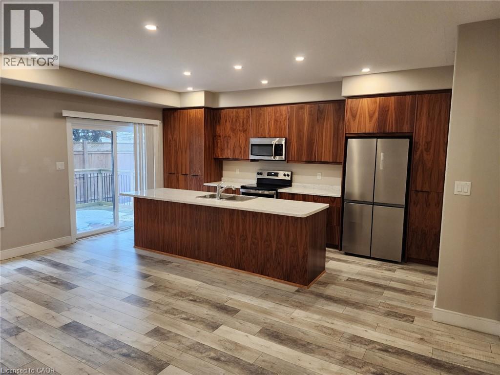 291 Falcon Drive Unit# 19, Woodstock, Ontario  N4T 0M7 - Photo 3 - 40797897