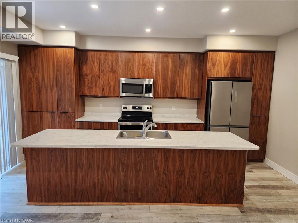 291 Falcon Drive Unit# 19, Woodstock, Ontario  N4T 0M7 - Photo 2 - 40797897