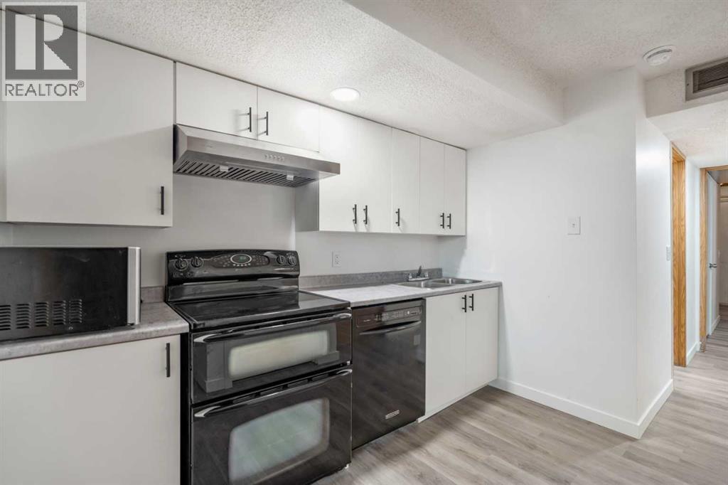 39 Bermuda Drive, Calgary, Alberta  T3K 1H5 - Photo 19 - A2278489