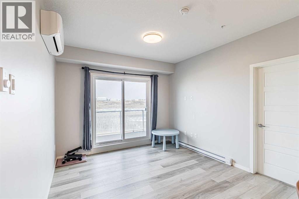 203, 360 Harvest Hills Way Ne, Calgary, Alberta  T3K 2S1 - Photo 6 - A2278153