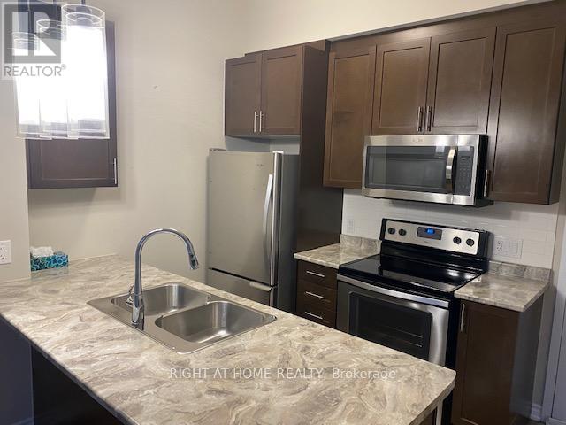 824 - 2490 Old Bronte Road, Oakville, Ontario  L6M 4J2 - Photo 4 - W12688832