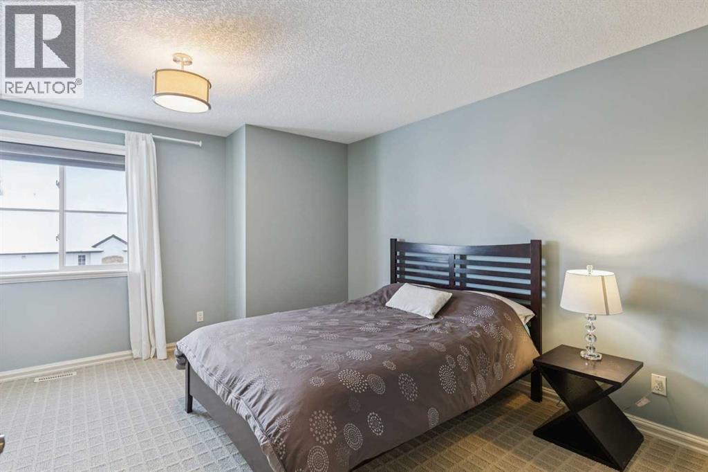 104 Strathridge Place Sw, Calgary, Alberta  T3H 4J1 - Photo 25 - A2270016