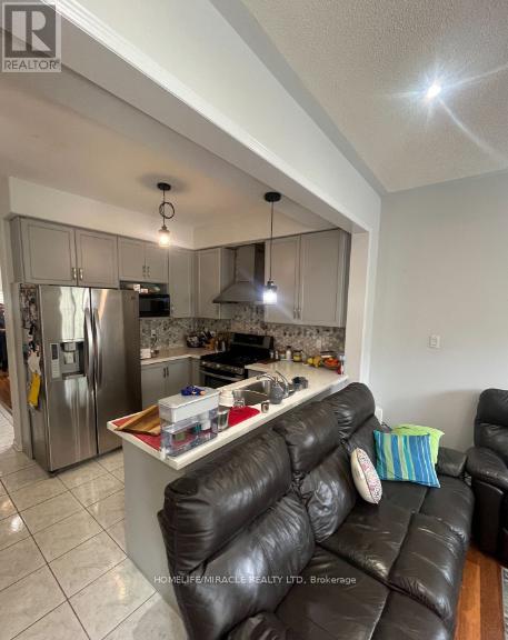 6912 Buttle Station Place, Mississauga, Ontario  L5W 1B8 - Photo 3 - W12688952