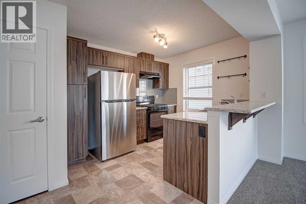 221 Hillcrest Gardens Sw, Airdrie, Alberta  T4B 4J2 - Photo 6 - A2277504