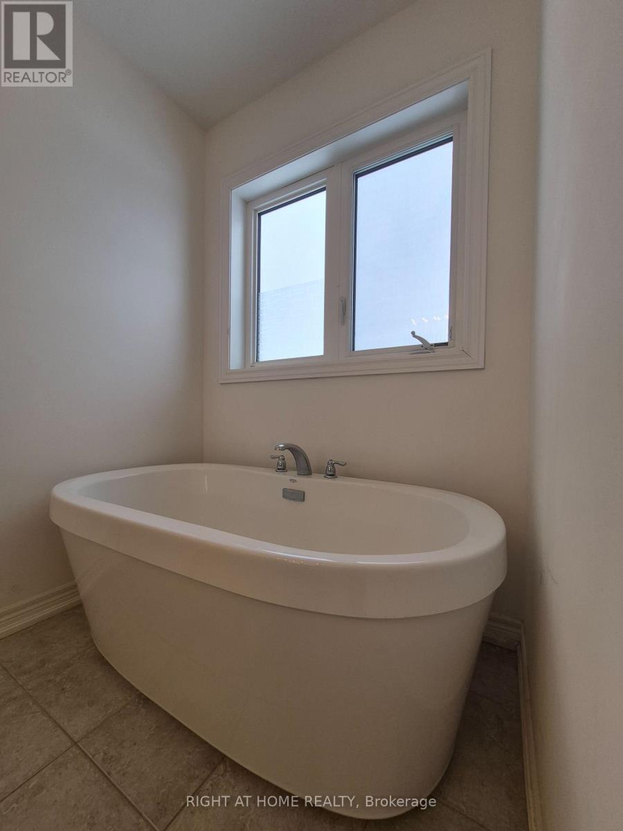 57 Sasco Way, Essa, Ontario  L3W 0C8 - Photo 23 - N12689182