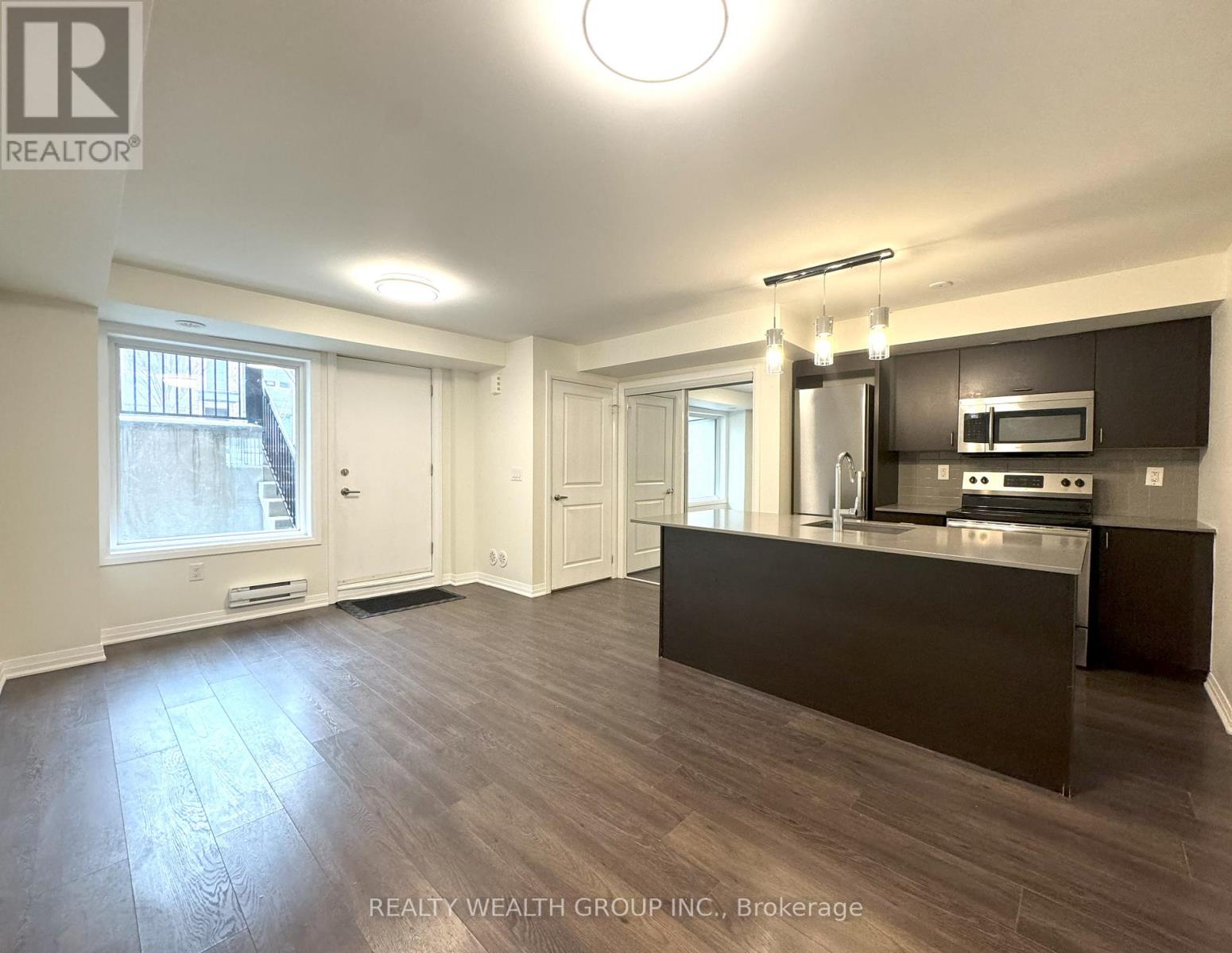5 - 159 William Duncan Road, Toronto, Ontario  M3K 0B9 - Photo 3 - W12689156