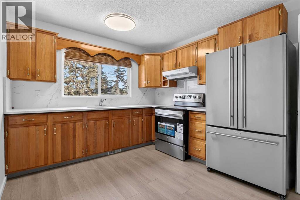 3283 Dover Ridge Drive Se, Calgary, Alberta  T2B 2A8 - Photo 6 - A2278584