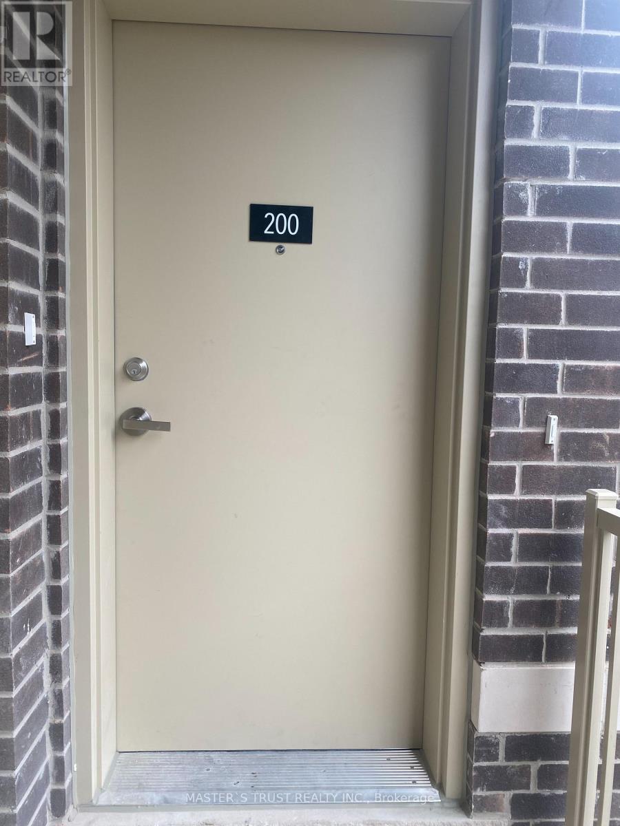 Th 200 - 10 Lloyd Janes Lane, Toronto, Ontario  M8V 0J6 - Photo 1 - W12689548