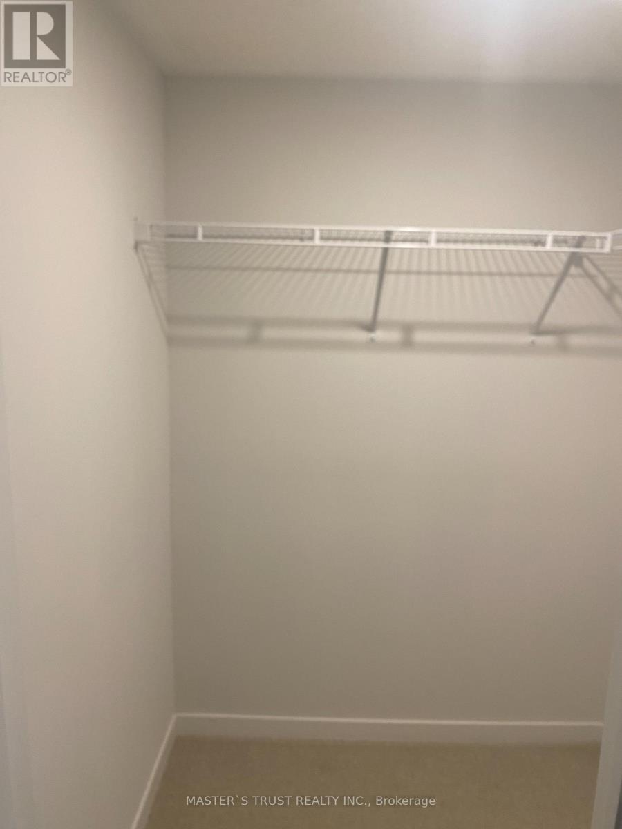 Th 200 - 10 Lloyd Janes Lane, Toronto, Ontario  M8V 0J6 - Photo 12 - W12689548