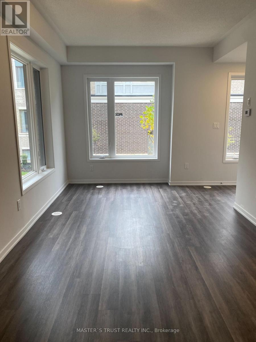 Th 200 - 10 Lloyd Janes Lane, Toronto, Ontario  M8V 0J6 - Photo 3 - W12689548