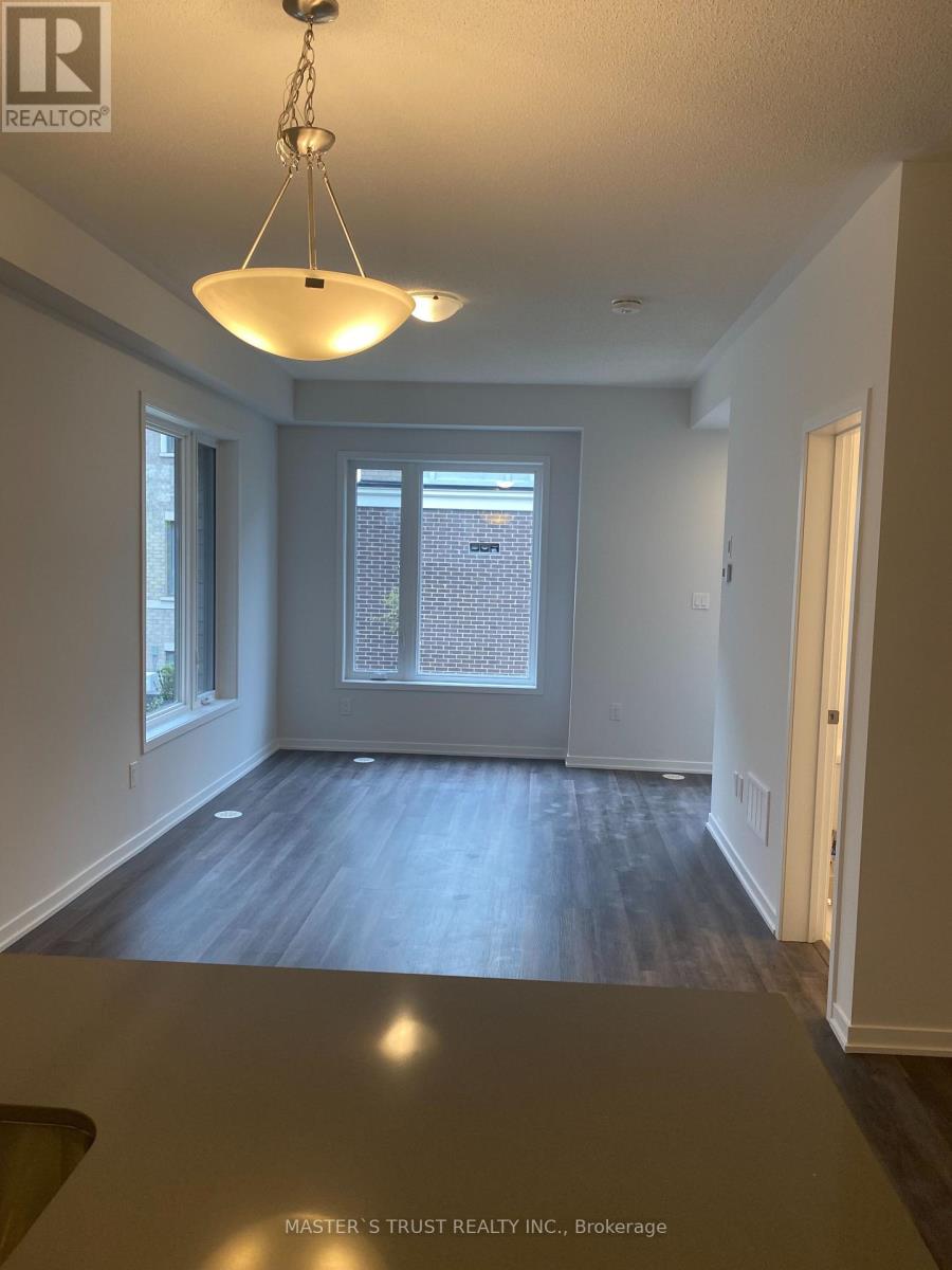 Th 200 - 10 Lloyd Janes Lane, Toronto, Ontario  M8V 0J6 - Photo 4 - W12689548