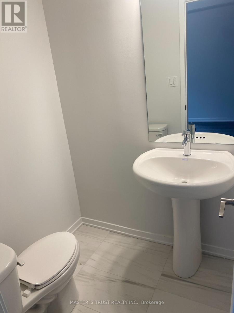 Th 200 - 10 Lloyd Janes Lane, Toronto, Ontario  M8V 0J6 - Photo 7 - W12689548