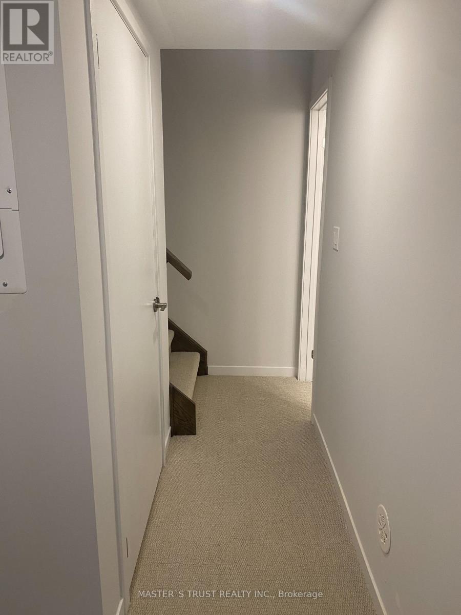 Th 200 - 10 Lloyd Janes Lane, Toronto, Ontario  M8V 0J6 - Photo 9 - W12689548