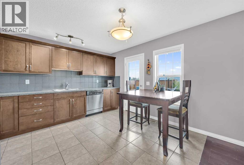 126 Windstone Avenue Sw, Airdrie, Alberta  T4B 3R3 - Photo 9 - A2273795