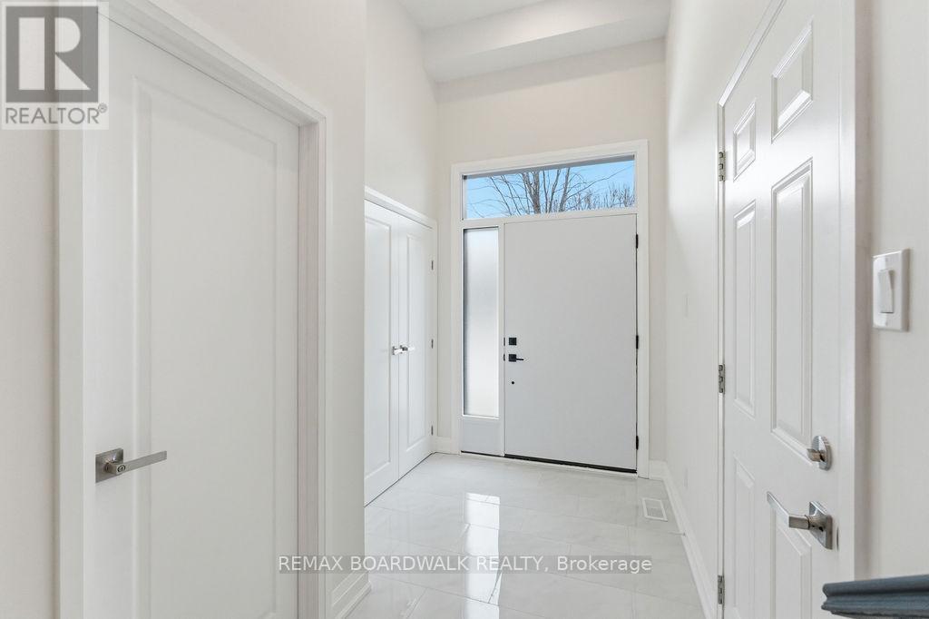 210 Harthill Way, Ottawa, Ontario  K2J 0P1 - Photo 3 - X12689786