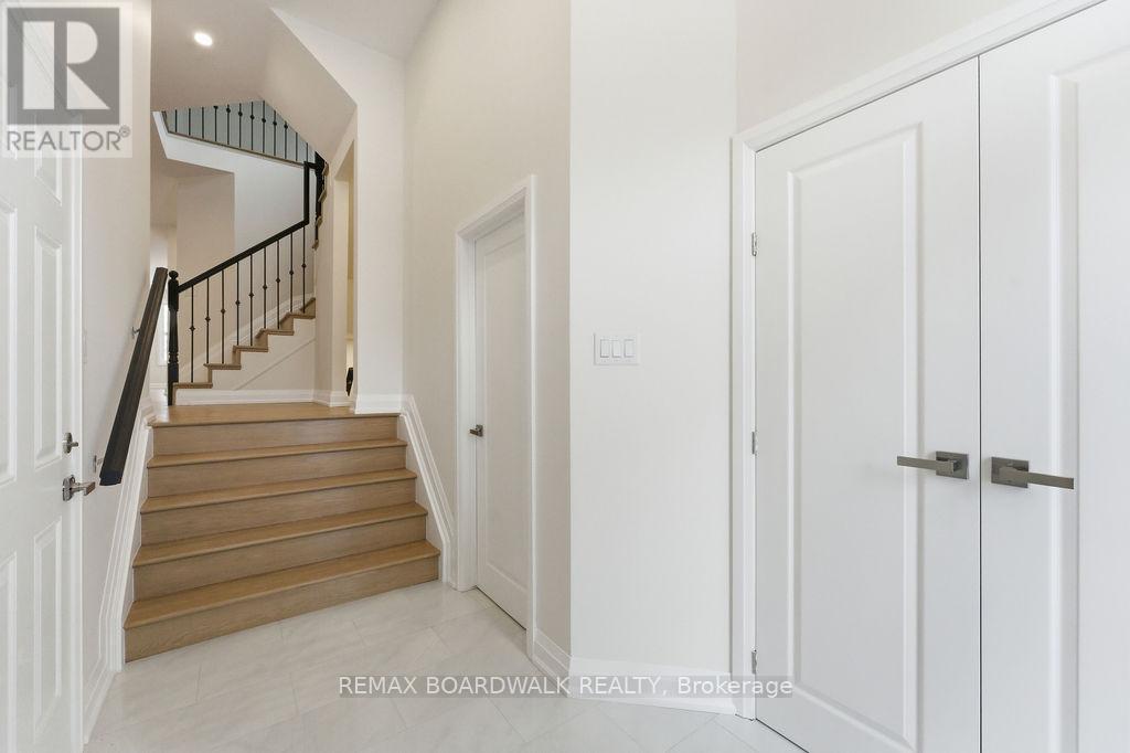 210 Harthill Way, Ottawa, Ontario  K2J 0P1 - Photo 4 - X12689786