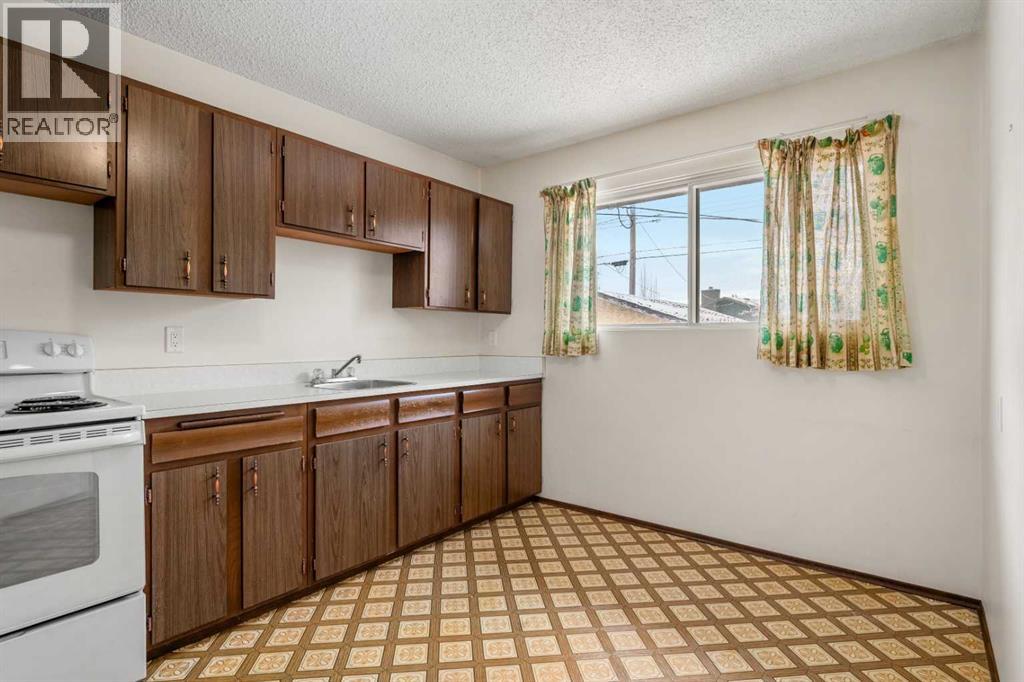 1151 Marcombe Crescent Ne, Calgary, Alberta  T2A 4H8 - Photo 12 - A2277400