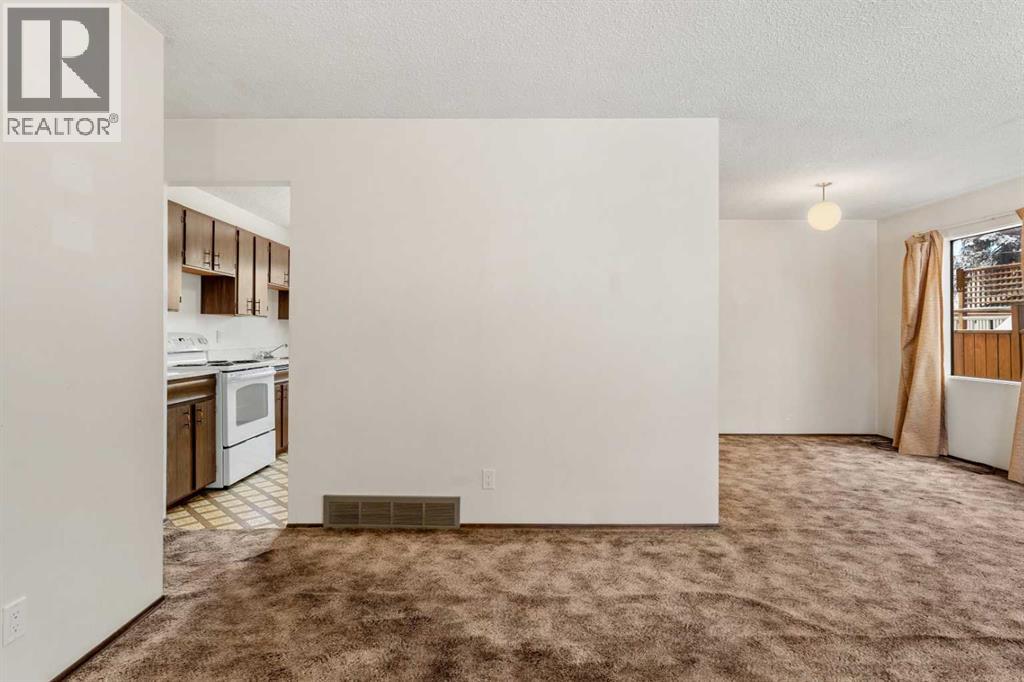 1151 Marcombe Crescent Ne, Calgary, Alberta  T2A 4H8 - Photo 8 - A2277400