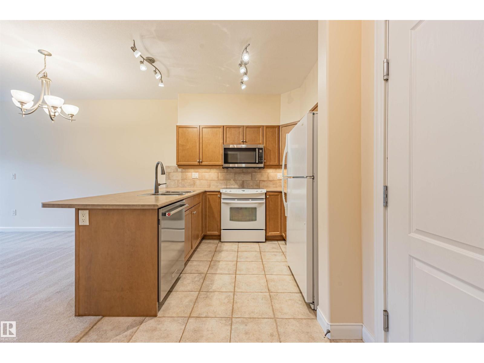 #110 1406 Hodgson Wy Nw, Edmonton, Alberta  T6R 3K1 - Photo 4 - E4469846