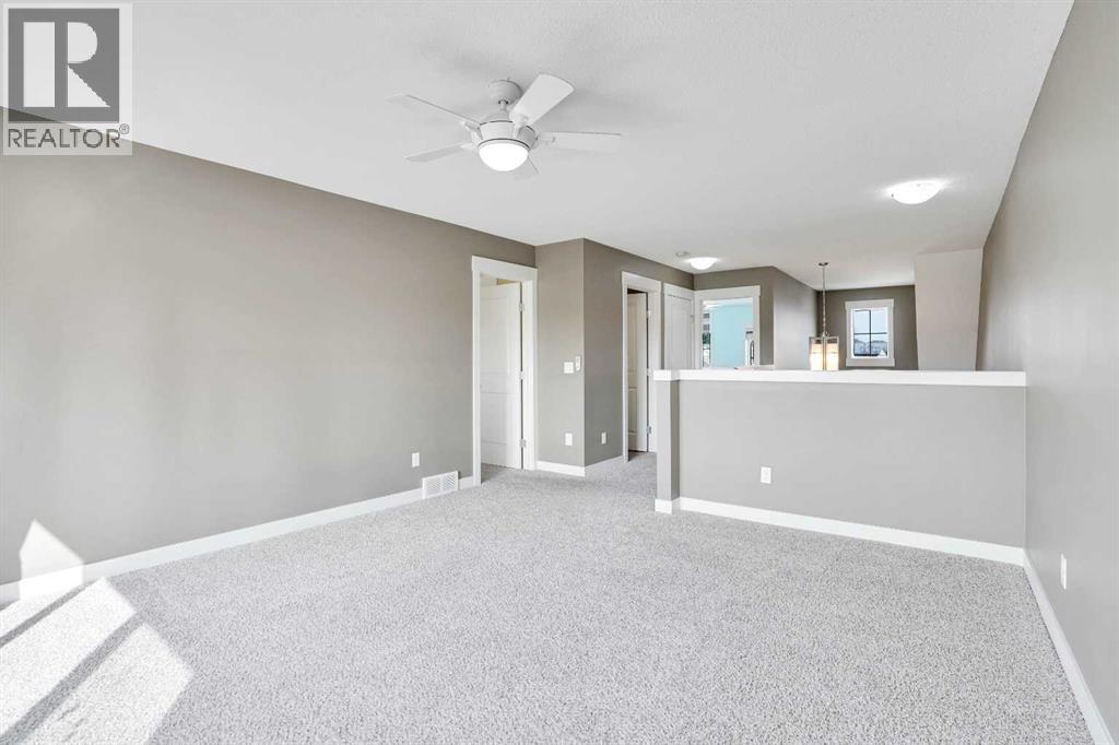 157 Rainbow Falls Boulevard, Chestermere, Alberta  T1X 0N6 - Photo 20 - A2276880