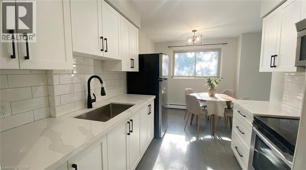 163 Chandler Drive Unit# 13, Kitchener, Ontario  N2E 1H1 - Photo 2 - 40797651