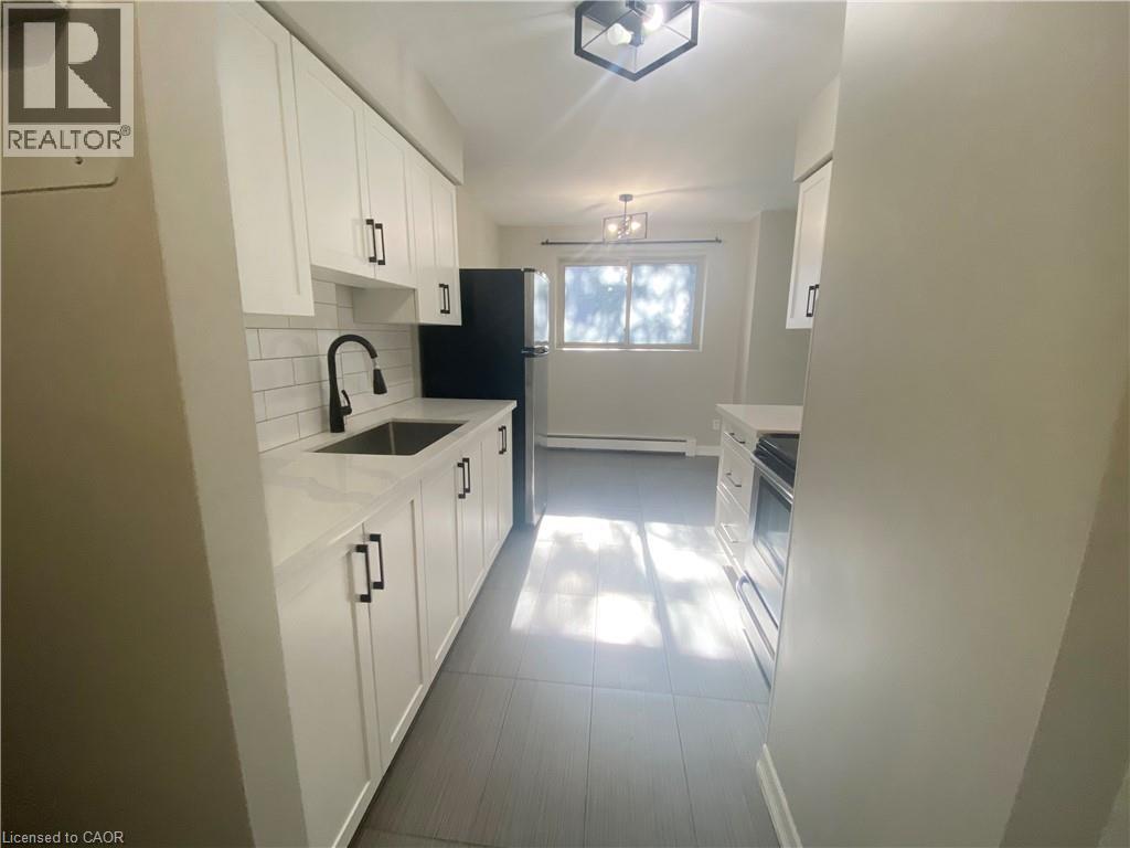 163 Chandler Drive Unit# 13, Kitchener, Ontario  N2E 1H1 - Photo 4 - 40797651