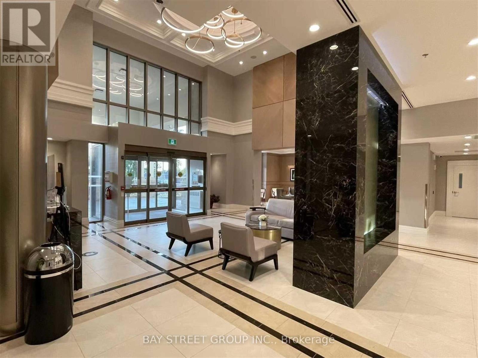 701 - 5698 Main Street, Niagara Falls, Ontario  L2G 0Z2 - Photo 1 - X12690080