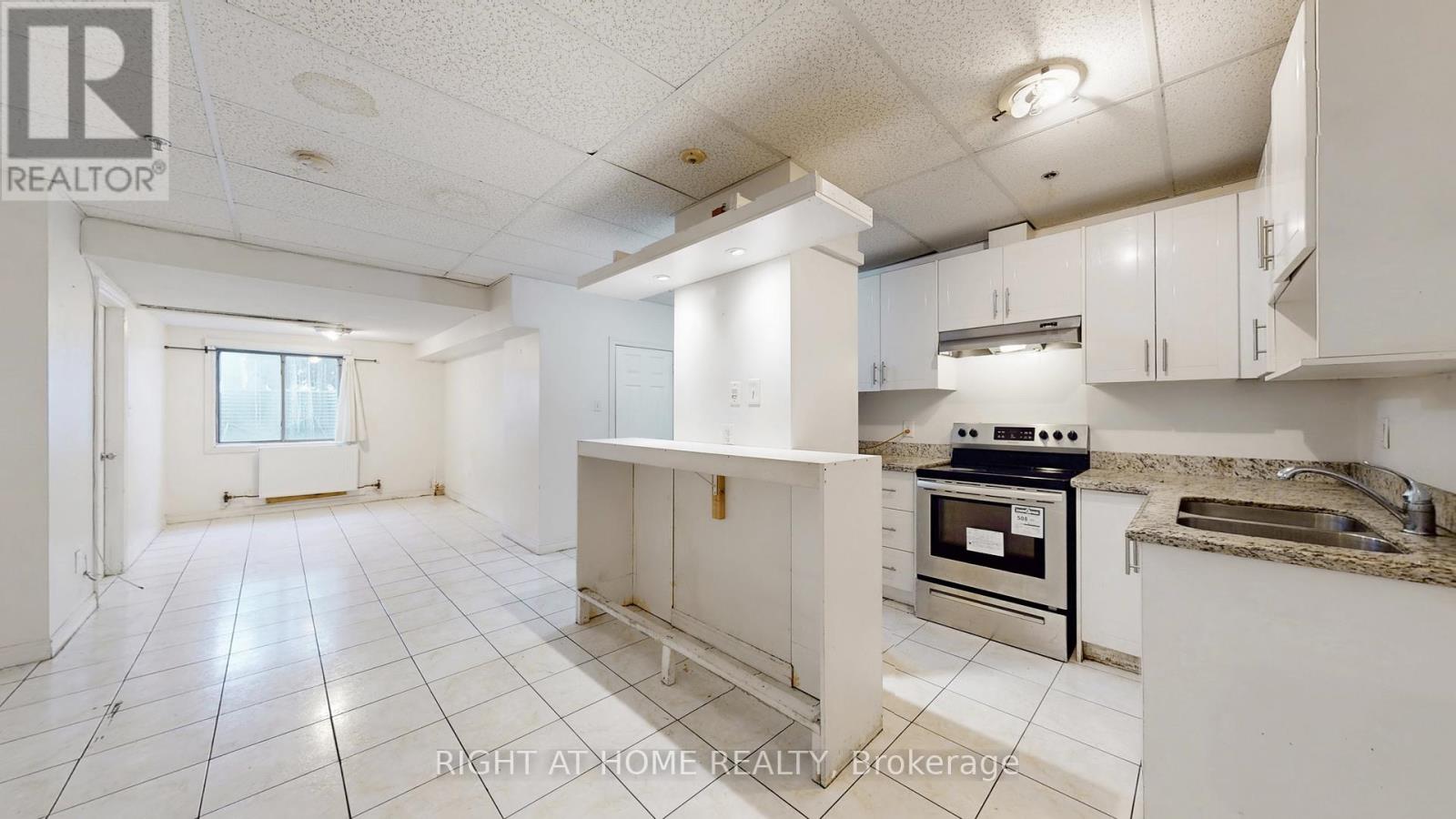 100 - 896 Eglinton Avenue E, Toronto, Ontario  M4G 2L2 - Photo 1 - C12690326