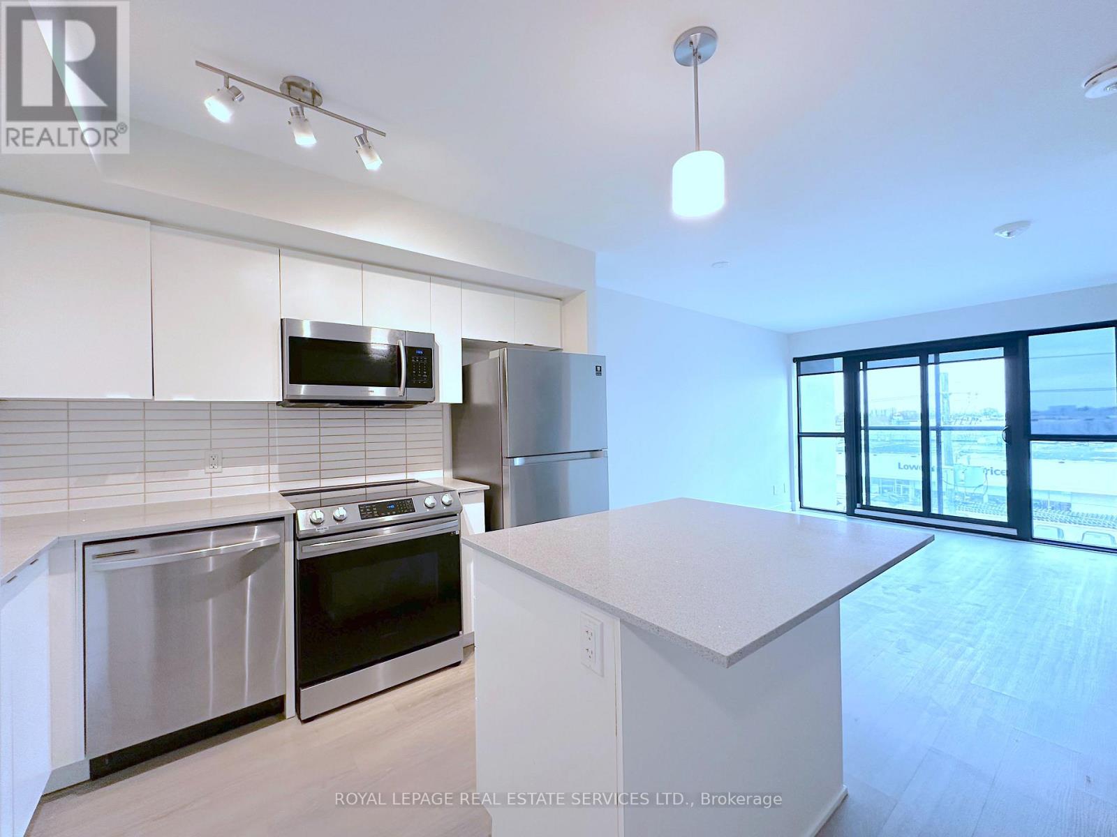 409 - 3385 Dundas Street W, Toronto, Ontario  M6S 2S2 - Photo 2 - W12690222