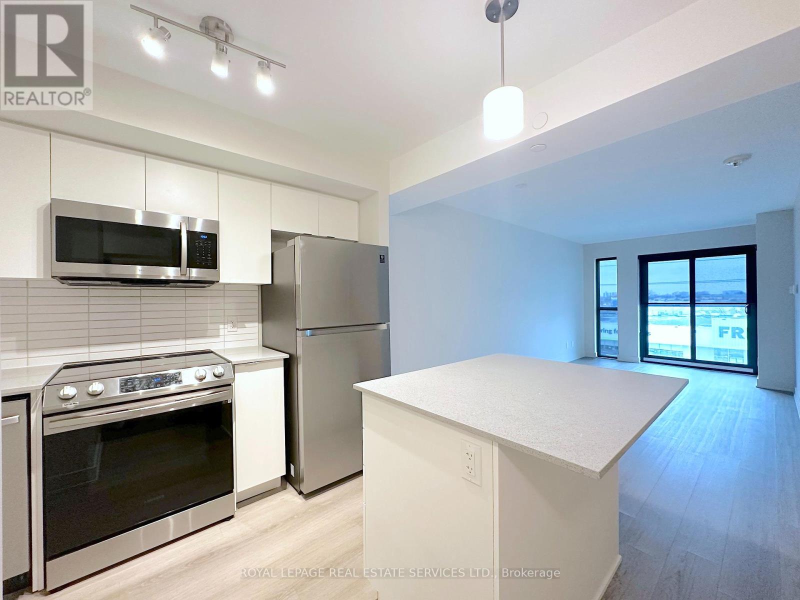 410 - 3385 Dundas Street W, Toronto, Ontario  M6S 2S2 - Photo 2 - W12690226