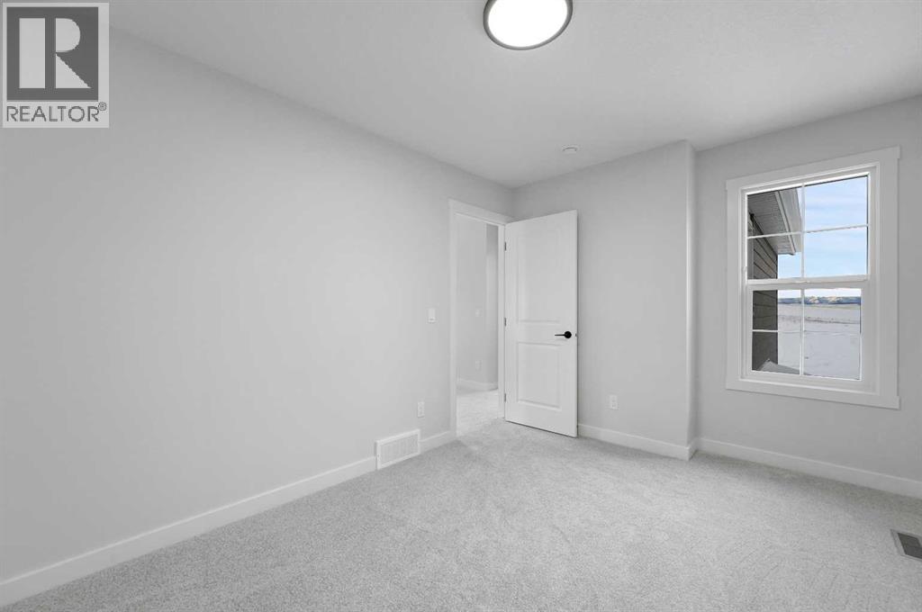 111 Fireside Street, Cochrane, Alberta  T3Z 2K5 - Photo 39 - A2272248