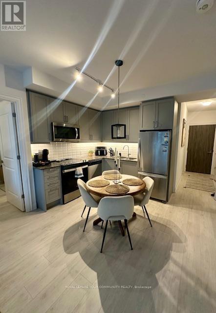 1409 - 10 Gatineau Drive, Vaughan, Ontario  L4J 0L2 - Photo 3 - N12690754