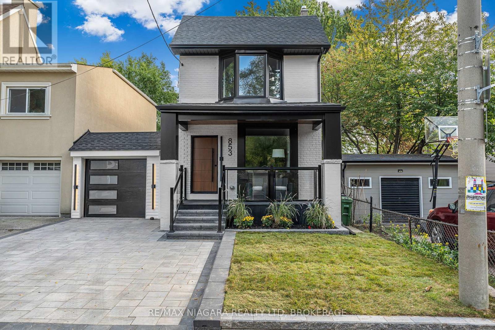 853 Sammon Avenue, Toronto, Ontario M4C 2E9 - Photo 1 - E12690856