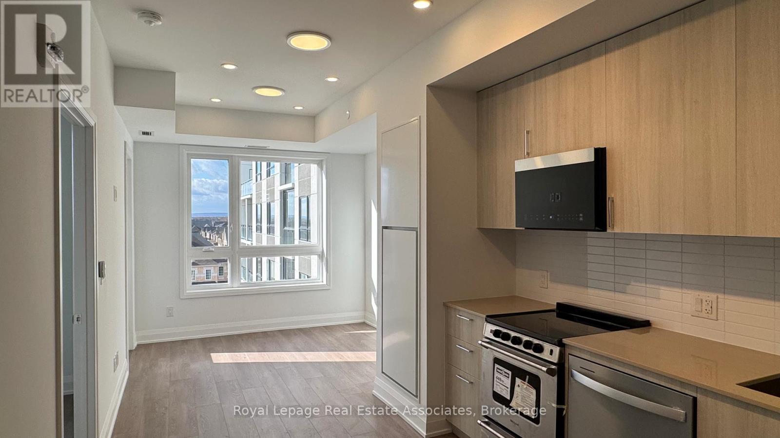 406 - 3250 Carding Mill Trail, Oakville, Ontario  L6M 1L3 - Photo 3 - W12566046