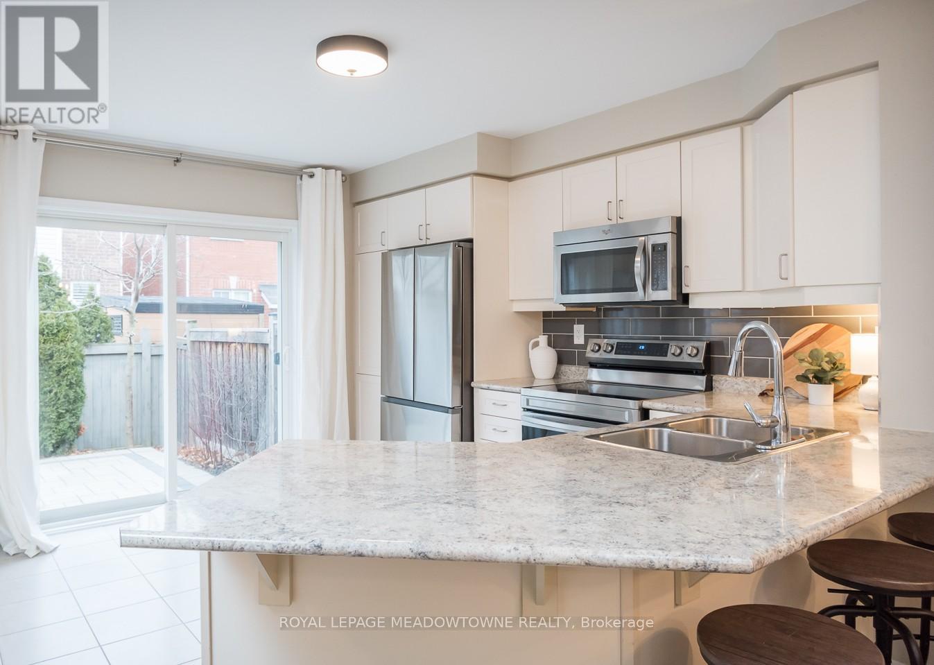 1667 Clitherow Street, Milton, Ontario  L9E 0A2 - Photo 13 - W12691014