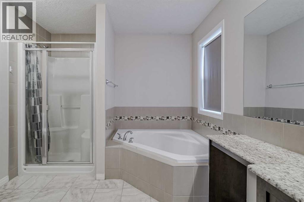 206 Pantego View Nw, Calgary, Alberta  T3K 0N7 - Photo 28 - A2275633