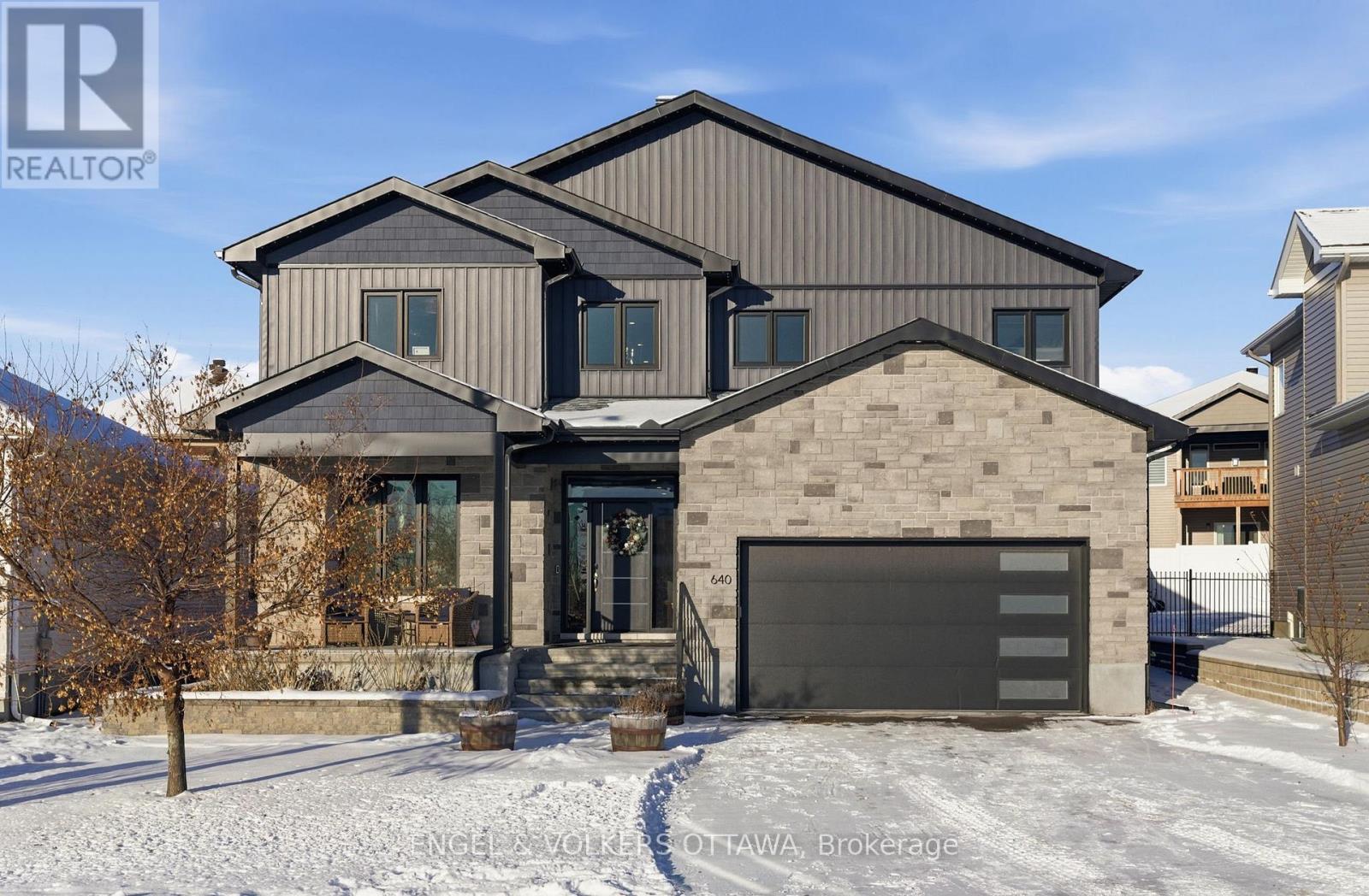 This beautiful family home is the largest model in the neighbourhood and truly checks all the boxes. A welcoming front foyer leads to a convenient home office, while the impressive 3-car garage features a durable Polyaspartic floor coating and opens into a convenient mudroom.The open-concept main living area boasts soaring vaulted ceilings and expansive windows that flood the space with natural light. The chef inspired kitchen offers high-end appliances, a stunning leathered stone countertop that feels like a true art piece, a walk-in pantry, pot filler, and a large island perfect for entertaining. The upper level, which overlooks the living room, includes 4 generous bedrooms all with walk-in closets, including a spacious primary suite complete with a large walk-in closet and luxurious ensuite bathroom, an upper floor laundry room and a family bathroom. The finished lower level with high ceilings, radiant in floor heating and a full bathroom offers endless possibilities-create a guest suite, personal gym, and/or entertainment room. Outside, the backyard oasis was fully completed in 2023 and designed for maximum enjoyment, featuring extensive landscaping and stonework, a sparkling saltwater pool, gazebo wired for a TV, stone fire pit, and an artificial turf area perfect for pets. This is the perfect home for a family to establish roots in a sought-after area, just a short walk to Carp village with its coffee shops, bakeries, restaurants, Carp Creamery, and the famous Carp Farmers' Market and fair. This home is worth a look - opportunities like this rarely come up in the area. (id:48254)